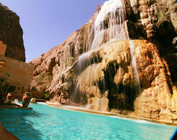 waterfall and pool at main hot springs resort jordan