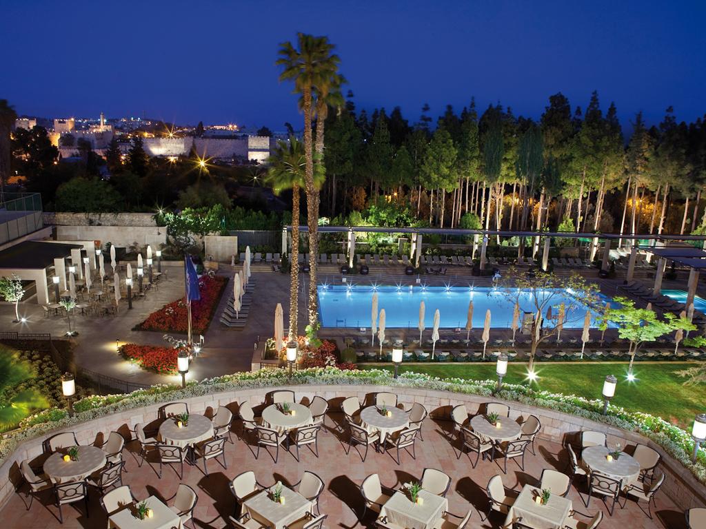 Overview of the outdoor pool and restaurant from the hotel